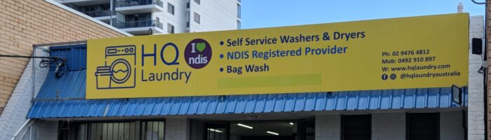 HQ Laundry front of shop sign